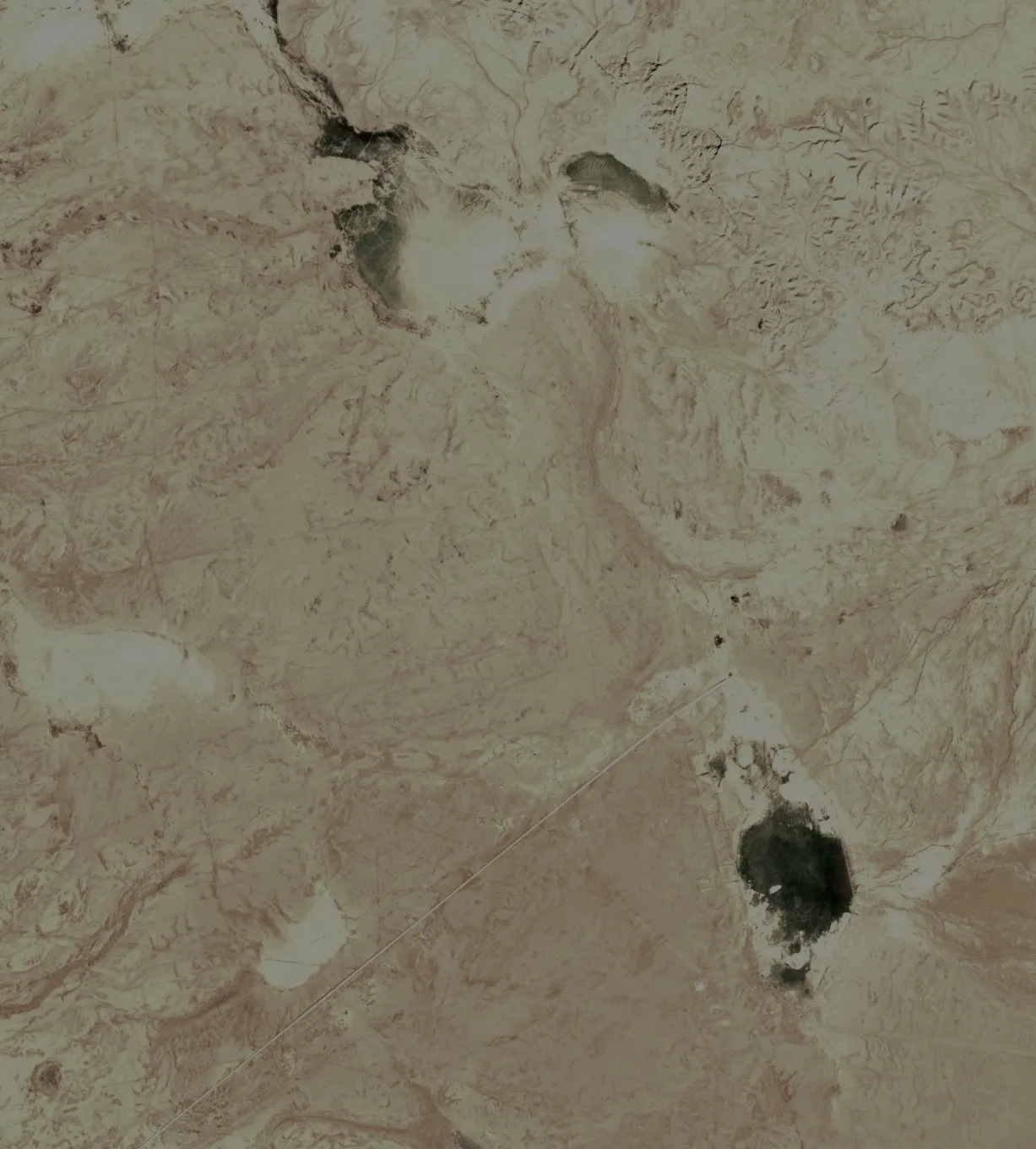 Satellite picture of the desert north of Riyadh, in pale browns and greys